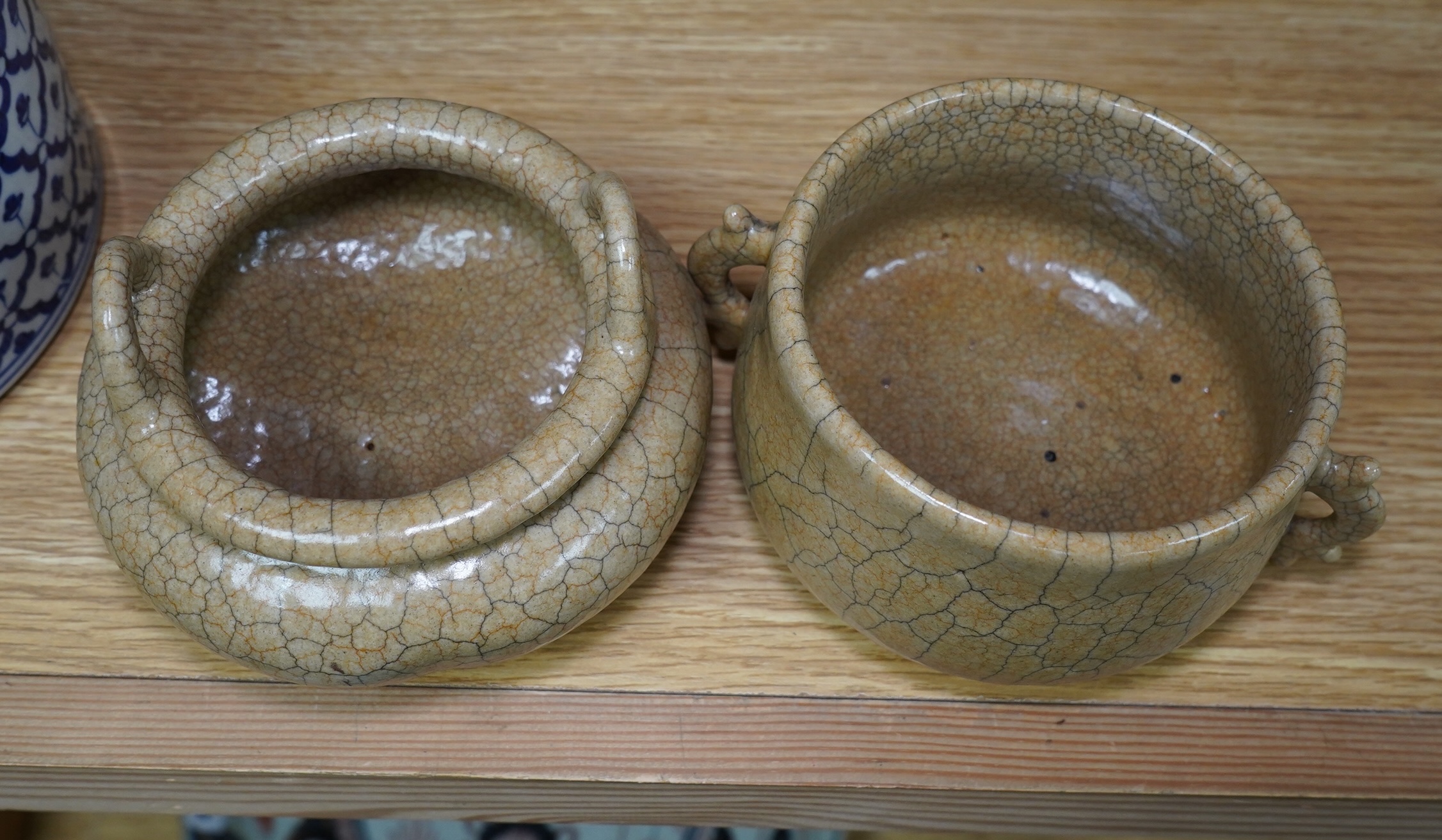 Two buff coloured crackle glazed censers including a tripod example, largest 17cm wide. Condition - good